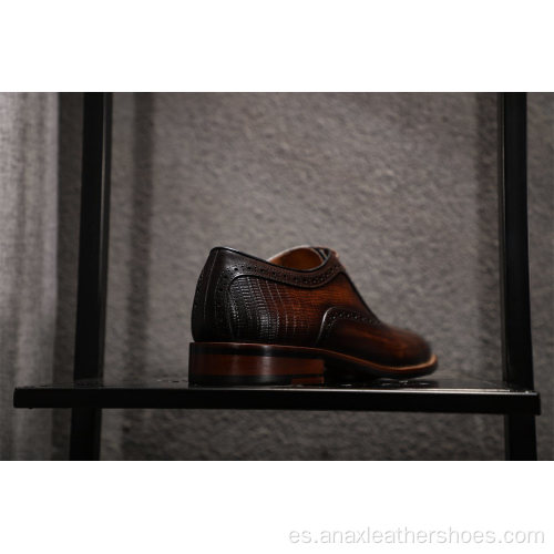 Zapatos casuales de hombre con correa de cuero en relieve